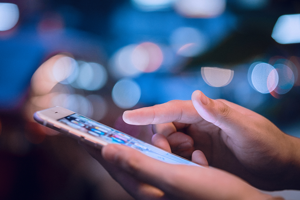 woman-hands-using-mobile-smart-phone